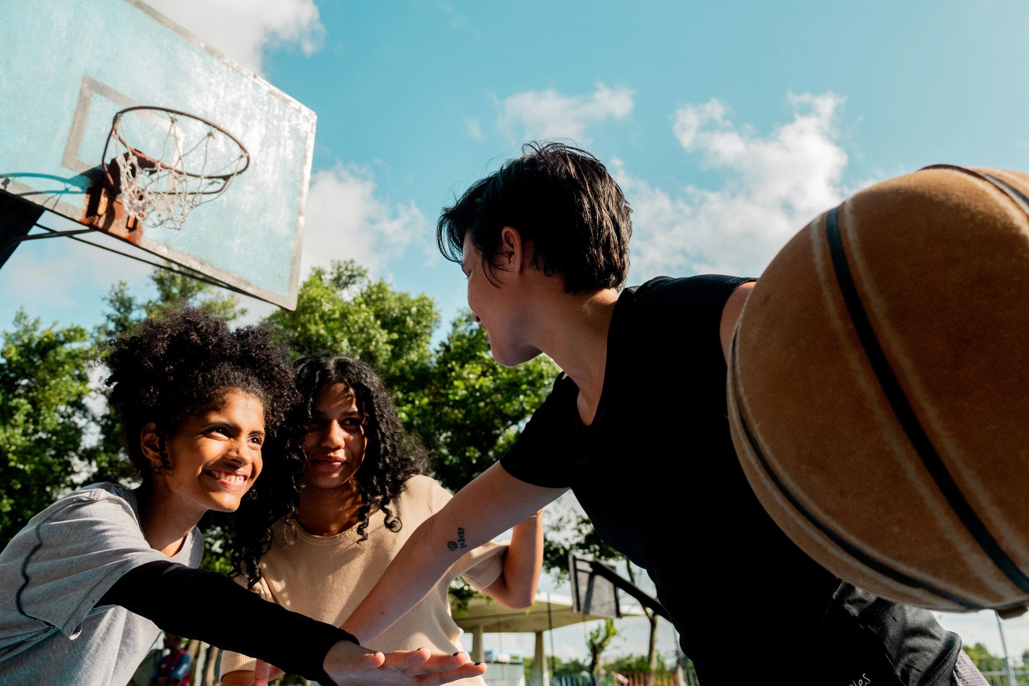 Players stacking hands in a team huddle